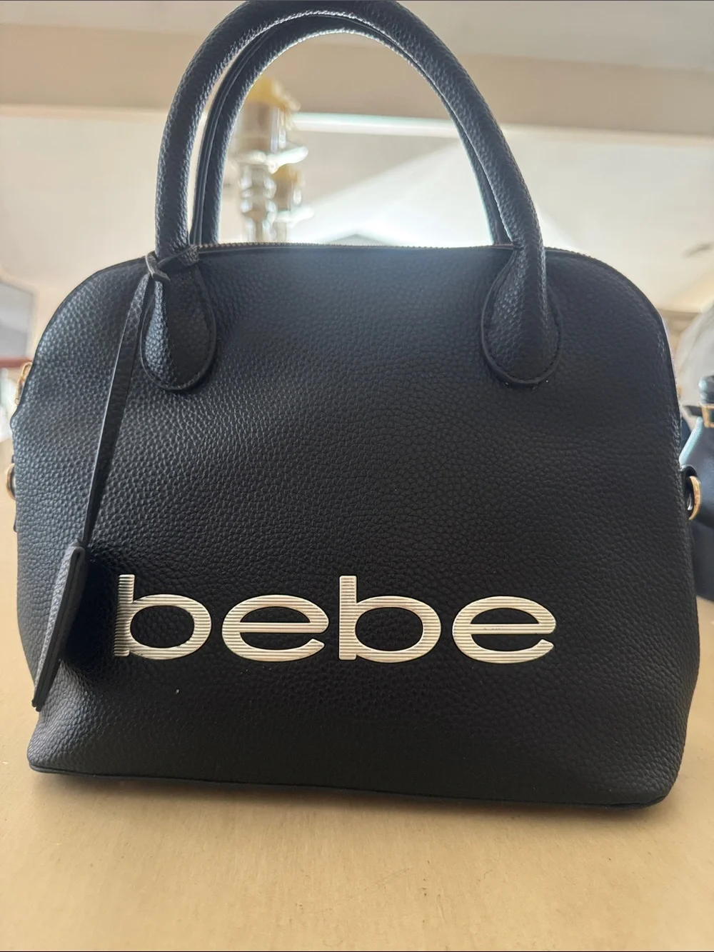 bebe Black Pebbled Dome Satchel with Silver Logo